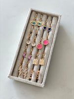 Load image into Gallery viewer, LOVE Gold Huggie Earrings
