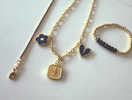Load image into Gallery viewer, SJD Charm Necklace in Navy &amp; Gold – Clover, Heart &amp; Lightning Bolt
