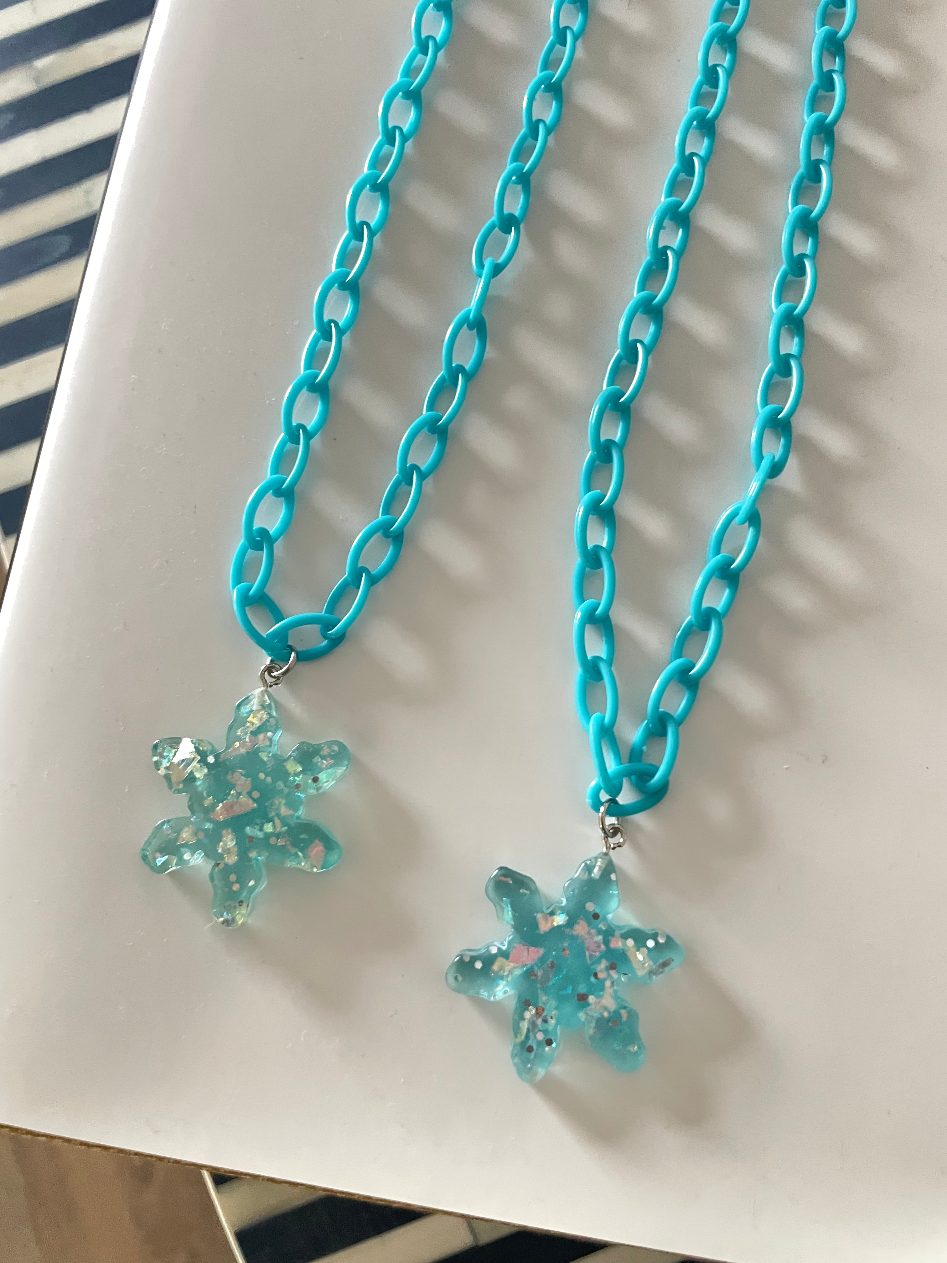Frozen Characters and Snowflake Necklaces