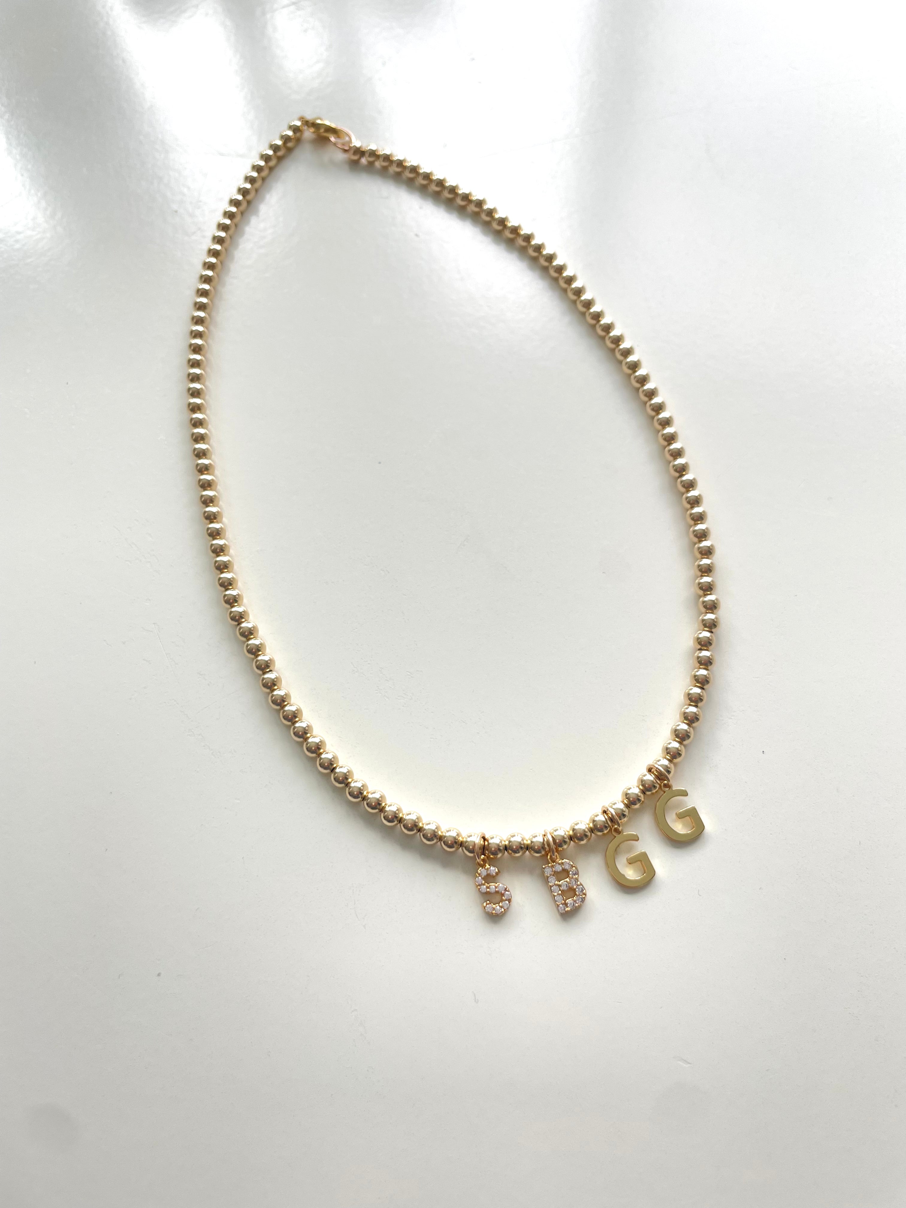 The LC Initial Gold Beaded Necklace