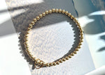 Load image into Gallery viewer, Gold Beaded Bracelet with Floating Heart
