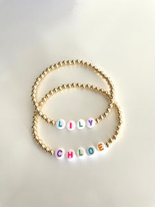 The Lily, Initial or Name Bracelet in Gold with Black on White Letter Beads