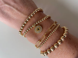 14k Gold Filled Beaded Bracelet with Round Evil Eye Charm