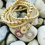 Load image into Gallery viewer, 14k Gold Filled Beaded Bracelet with Round Evil Eye Charm
